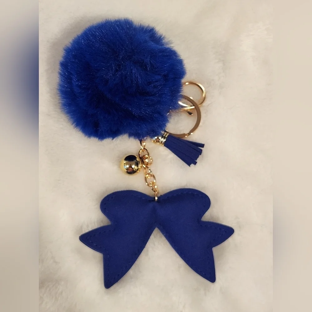 Elegant Blue Bow Keychain with Pom Pom Bag Char.